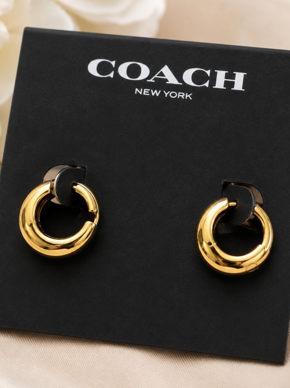 Coach Gold-Tone Huggie Hoop Earrings - Picture 1 of 3